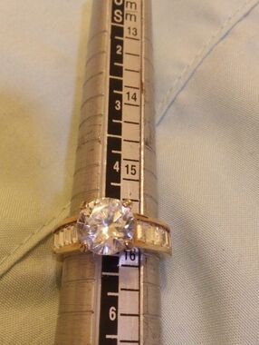 Classic Gold Solitaire Engagement Ring with Clear Center Stone